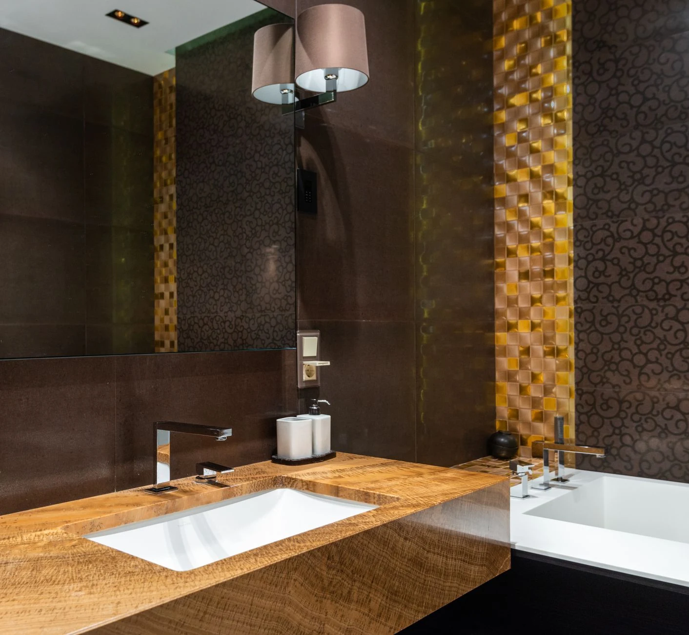 Warm bathroom vanity with stone countertop and elegant finishes