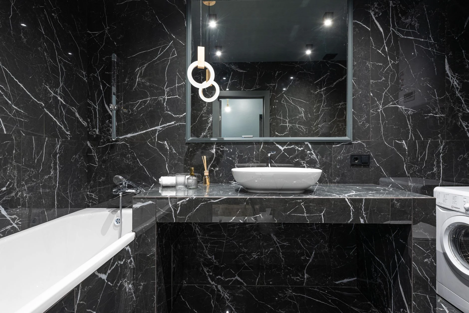 Dramatic black stone bathroom countertop and vanity